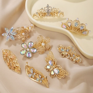 Elegant gold alloy hair clips set with pearls and rhinestones in flower and crown designs