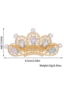 Detailed close-up of golden crown hair clip with pearls and teardrop crystals