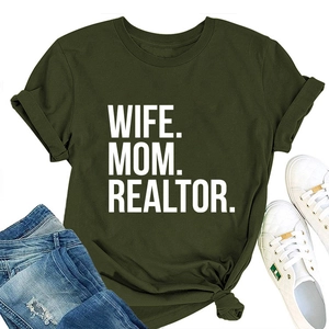 Detail of olive green t-shirt with WIFE MOM REALTOR text, styled with denim and sneakers