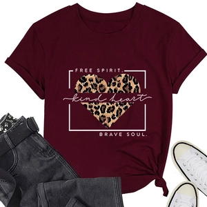 Flat lay of burgundy t-shirt with leopard heart print and free spirit brave soul slogan