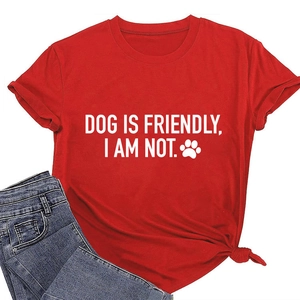 Detail of red crew neck T-shirt with white text print and side knot accent