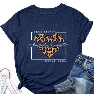 Flat lay of navy T-shirt with Free Spirit leopard heart print and denim outfit
