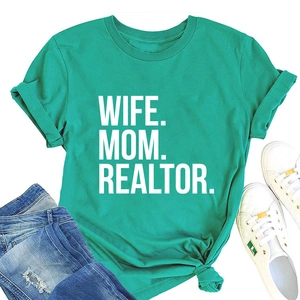 Flat lay of a teal WIFE MOM REALTOR t-shirt styled with denim jeans and white sneakers