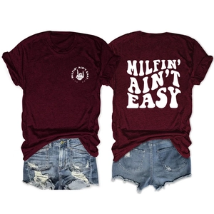 Detail of burgundy T-shirt with white skull hand print and MILFIN slogan on cotton fabric