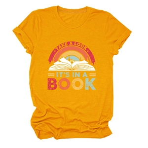 Close-up of vintage rainbow print and open book graphic on ginger cotton T-shirt