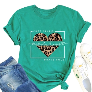 Detailed view of teal cotton T-shirt featuring a leopard print heart and artistic text