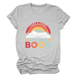 Close-up of vintage graphic print with forest and book design on grey cotton t-shirt