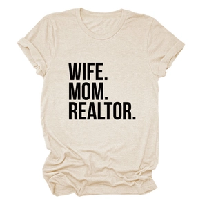 Detailed view of beige crew neck t-shirt with black WIFE MOM REALTOR text and rolled sleeves