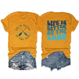 Detailed front and back view of mustard yellow T-shirt and distressed denim shorts set