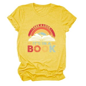 Macro detail of retro 'Take a look' rainbow print on yellow cotton blend fabric