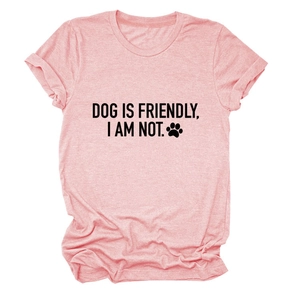 Detailed view of pink cotton T-shirt featuring DOG IS FRIENDLY black graphic print