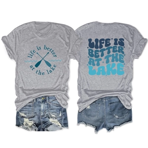 Front and back view of life is better at the lake graphic tee with denim shorts