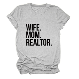 Close-up of grey Wife Mom Realtor t-shirt with rolled sleeves on white background