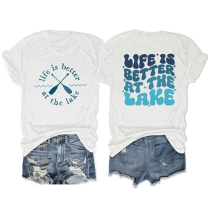 Front and back detail of white lake life graphic t-shirt with blue denim shorts