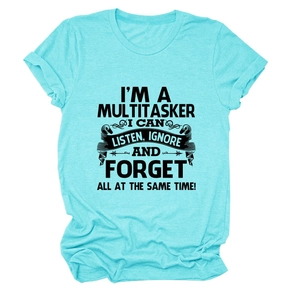 Detail of screen-printed black humor slogan on a bright turquoise cotton t-shirt