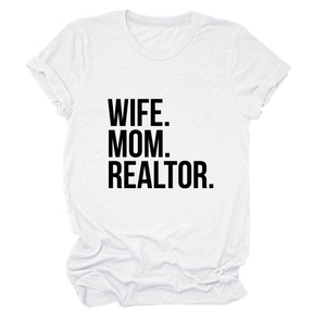 Close-up of WIFE MOM REALTOR bold black text print on white cotton crew neck t-shirt