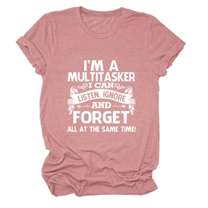 Detail of loose fit crew neck t-shirt in dusty rose with white slogan print text