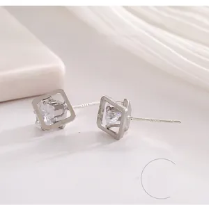 Detailed view of S925 sterling silver stamp on square zircon stud earrings