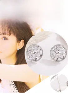 Detailed view of silver stud earring featuring multi-cut zircon stones and S925 hallmark