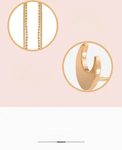 Detail of Korean style star moon tassel earrings with polished gold plating and bead chains