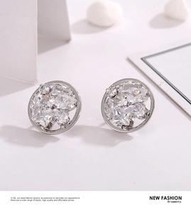 Macro shot of 925 silver stud earrings featuring layered geometric zircon cluster design
