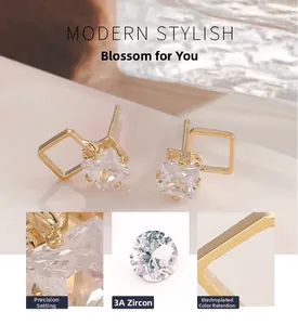 Macro detail of princess cut 3A cubic zirconia stud earrings with gold plating finish