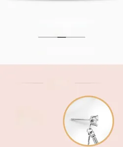 Detailed close-up of hypoallergenic 925 sterling silver needles on tassel earrings