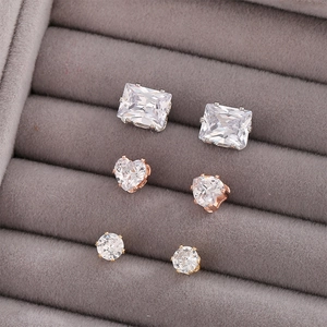 Three-pair silver stud earring set featuring rectangle, heart, and round cubic zirconia