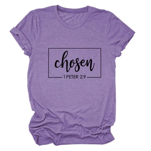 Close-up of purple t-shirt featuring black chosen and 1 peter print with rolled sleeve cuff