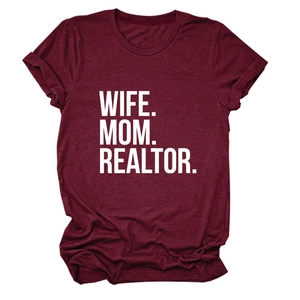 Close-up of WIFE MOM REALTOR bold white print on wine red cotton casual t-shirt