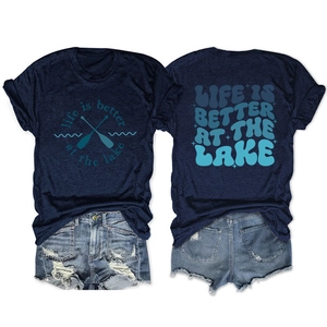 Front and back view of navy blue lake-themed T-shirt with white graphic prints