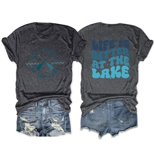 Detail of charcoal grey cotton t-shirt with Lake art print and ripped denim shorts
