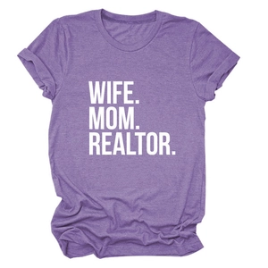 Detail of purple cotton T-shirt featuring bold white WIFE MOM REALTOR text and round neck