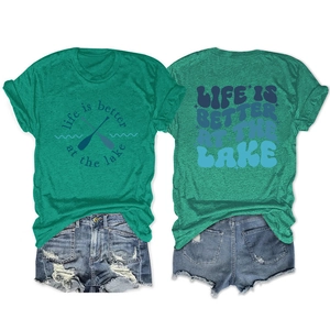 Detailed front and back view of green Life Is Better At The Lake cotton graphic tee