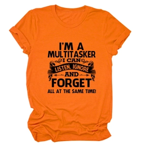 Detail of rolled cuffs and black retro text on bright orange crew neck cotton t-shirt