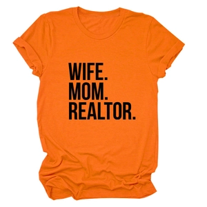 Detail of soft cotton orange t-shirt featuring bold WIFE MOM REALTOR text on front