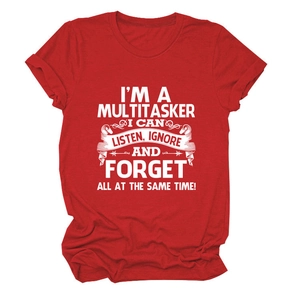 Detailed flat lay of a red cotton T-shirt featuring a white multitasker quote print