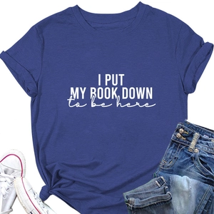 Blue t-shirt with 'I PUT MY BOOK DOWN' print, rolled sleeves and casual styling