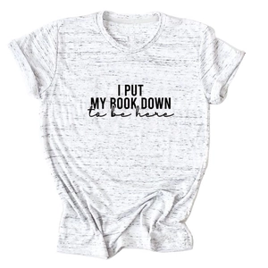 Close-up of 'I PUT MY BOOK DOWN' slogan print on marl grey cotton t-shirt with rolled sleeves