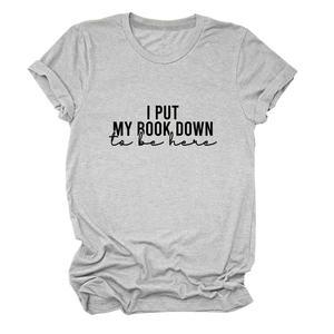 Macro detail of the roll-up sleeve and high-quality gray cotton fabric on a casual T-shirt