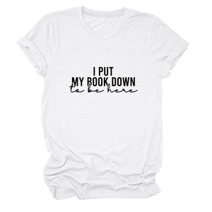 Detail of white cotton t-shirt featuring I Put My Book Down print and rolled sleeves