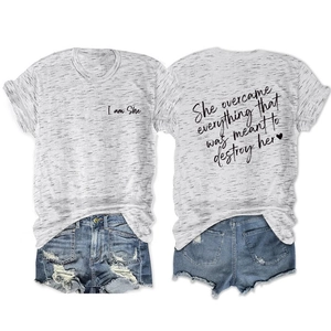 Front and back view of grey 'She Overcame Everything' T-shirt and denim shorts set