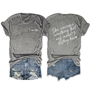 Front and back detail of grey t-shirt and denim shorts with inspirational print