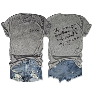 Front and back view of grey cotton T-shirt with inspirational quote and denim shorts