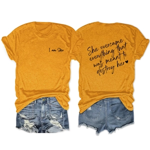 Detailed back view of a yellow cotton T-shirt featuring motivational black typography