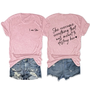 Detailed front and back view of pink heather t-shirt with inspirational text and denim shorts