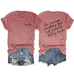Front and back detail of a red t-shirt with heart print and distressed denim shorts