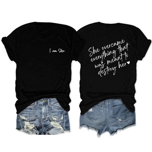 Front and back view of black cotton T-shirt with inspirational lettering and denim shorts