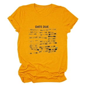 Detail of ginger yellow t-shirt showing soft cotton texture and retro date print design