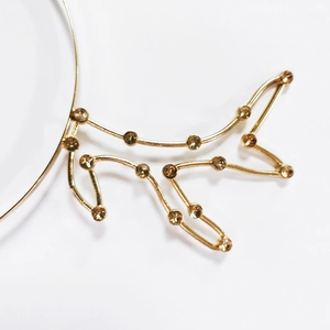 Golden Christmas reindeer antler headband with sparkling champagne rhinestones for parties